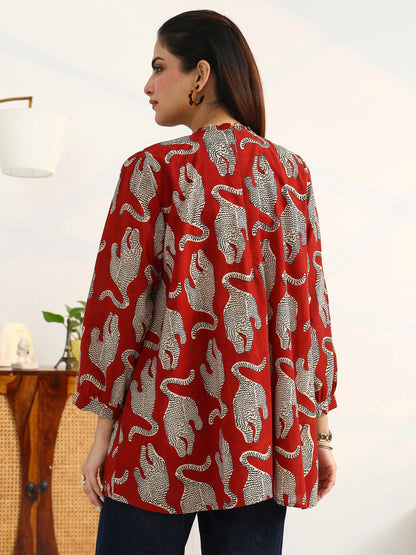 rust-tribal-printed-cotton-blend-straight-kurti
