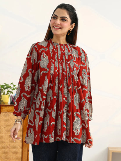 rust-tribal-printed-cotton-blend-straight-kurti