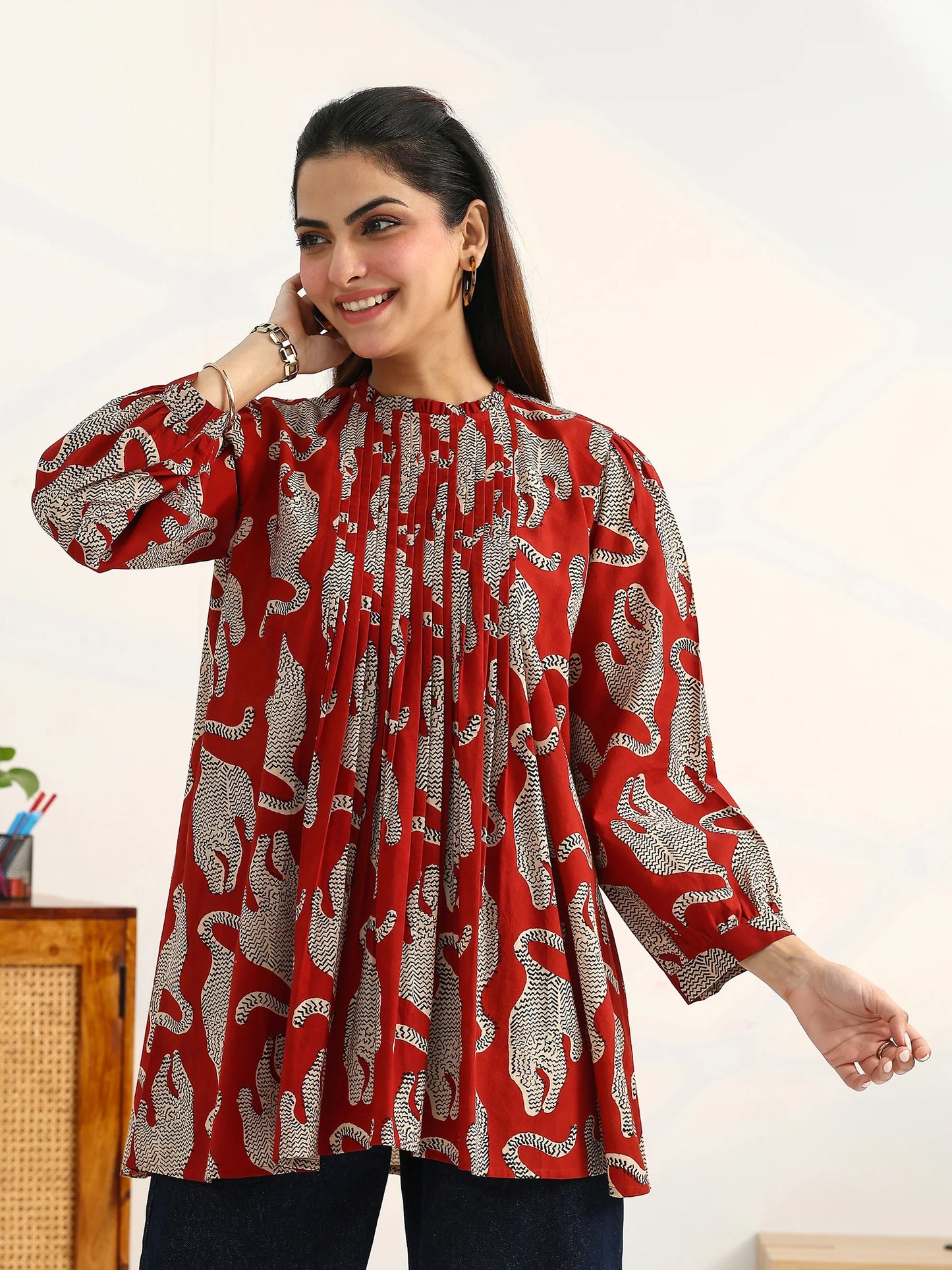 rust-tribal-printed-cotton-blend-straight-kurti