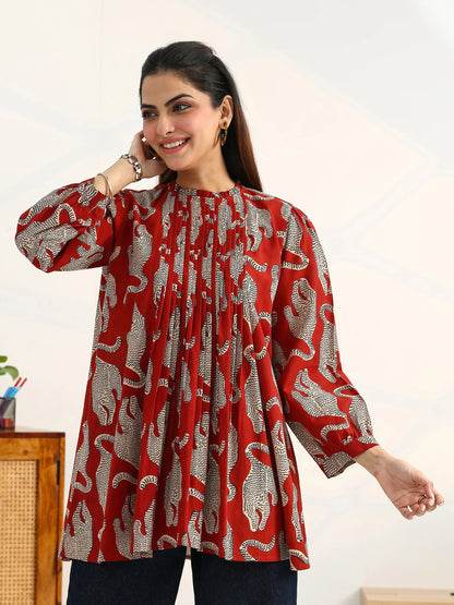rust-tribal-printed-cotton-blend-straight-kurti